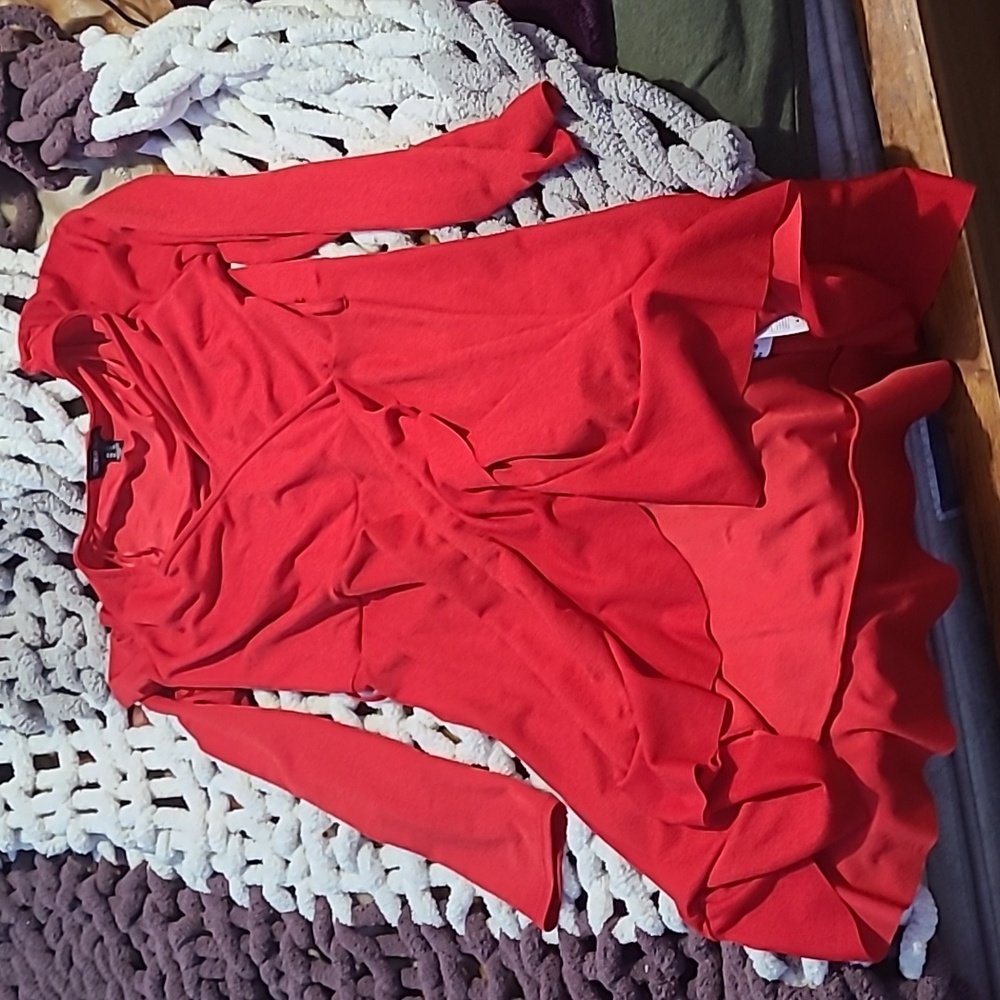 Red, long sleeve, ruffle slit at the bottom, mid length